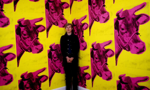 Andy Warhol with Cow Wallpaper